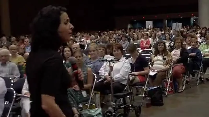 Jodee Blanco speaking to a large audience