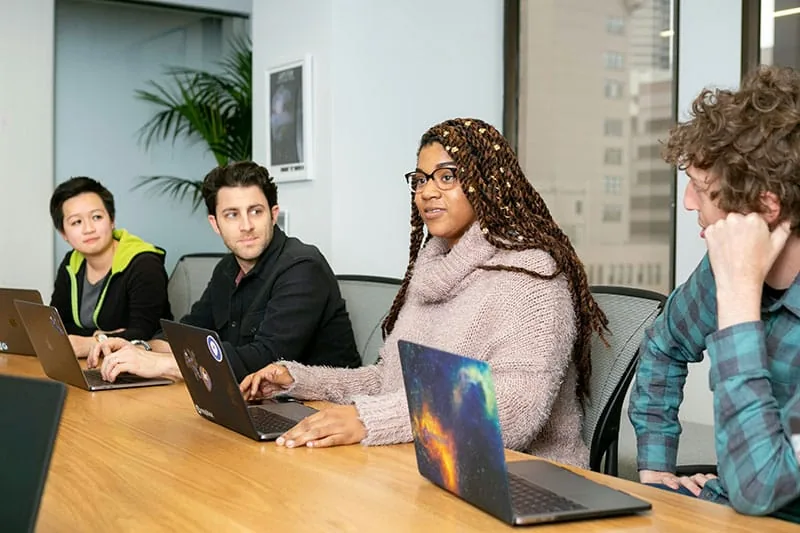 Young professionals working together at a conference table